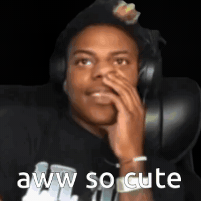 Man In Headphones Covering Mouth GIF