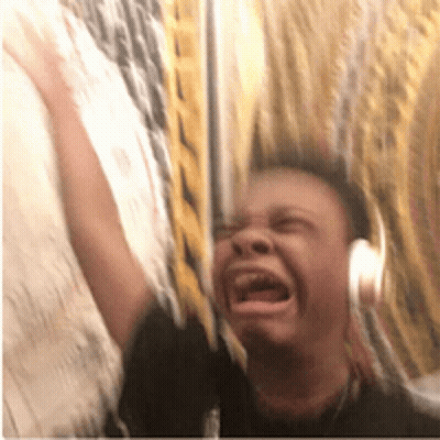 Man In Headphones Crying And Screaming GIF