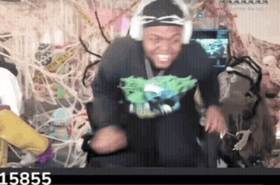 Man In Headphones Dancing In Front Of Screen With Number 15855 GIF