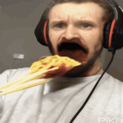 Man In Headphones Eating Spaghetti GIF
