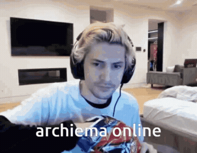 Man In Headphones Holding Chips Saying Archiema Online GIF
