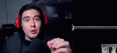 Man In Headphones Making Funny Face Playing Video Game GIF