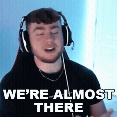 Man In Headphones Making Funny Face Saying We're Almost There GIF
