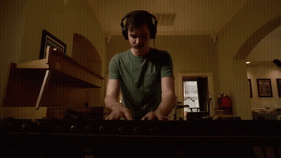 Man In Headphones Playing Keyboard GIF