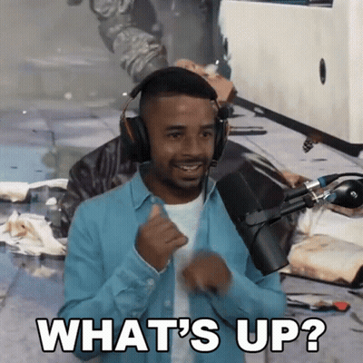 Man In Headphones Saying What's Up At Microphone GIF