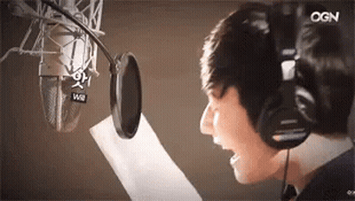 Man In Headphones Singing Into Microphone GIF