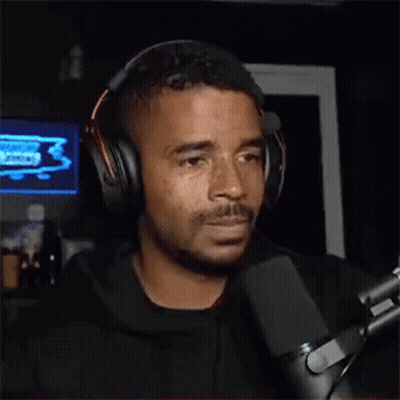 Man In Headphones Singing Into Microphone GIF