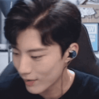 Man In Headphones Sitting In Chair GIF