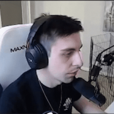 Man In Headphones Sitting With Microphone GIF
