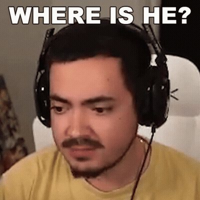 Man In Headphones Sitting With Where Is He GIF