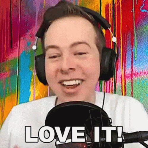 Man In Headphones Smiling At Microphone Saying Love It GIF