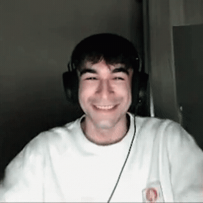Man In Headphones Smiling GIF