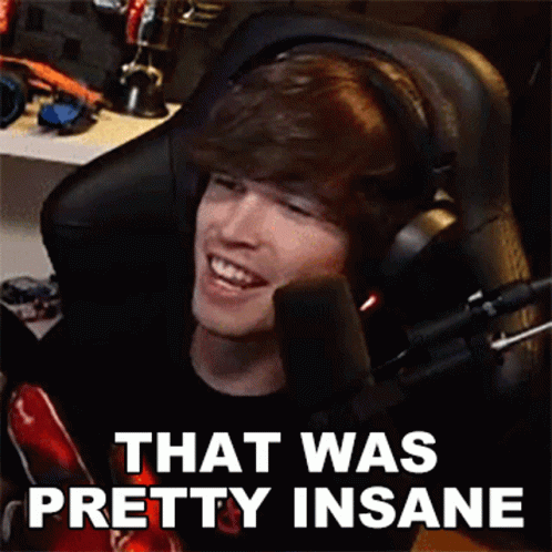 Man In Headphones Smiling In Gaming Chair GIF