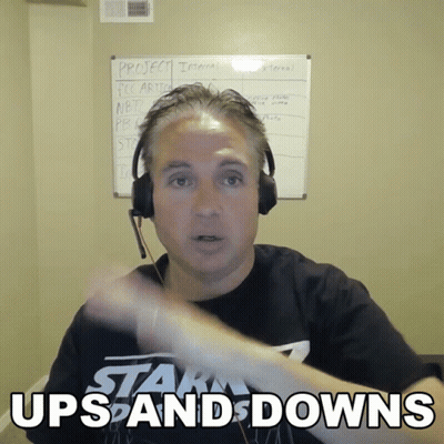 Man In Headphones Wearing Stark Ups And Downs Shirt GIF