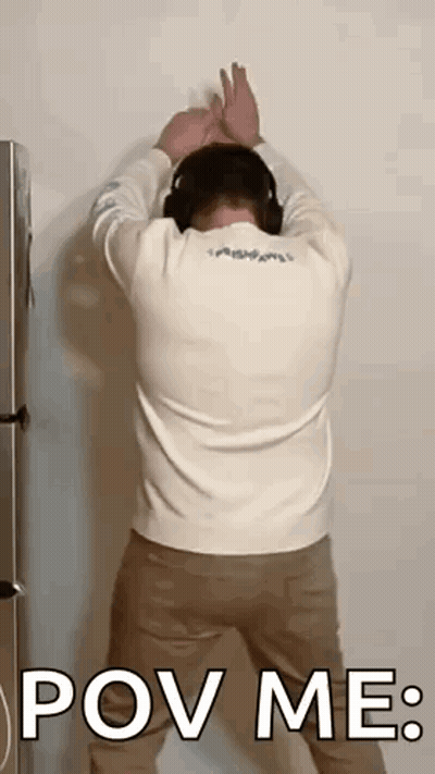 Man In Headphones With Hands Behind Head GIF