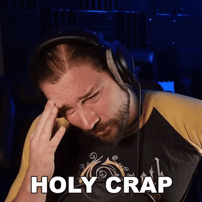 Man In Headphones With Holy Crap Shirt GIF