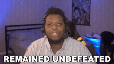 Man In Headphones With Remained Undefeated Shirt GIF
