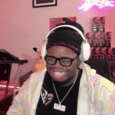 Man In Headphones With UAE Pendant GIF