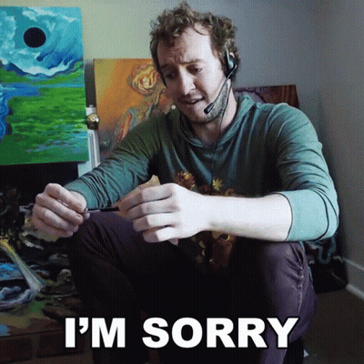 Man In Headset Saying I'm Sorry Holding Pen GIF