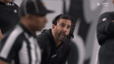 Man In Headset With NFL Logo GIF