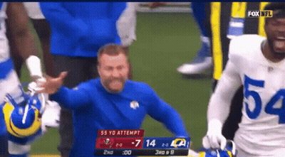 Man In Headset With Number 70 On Shirt GIF