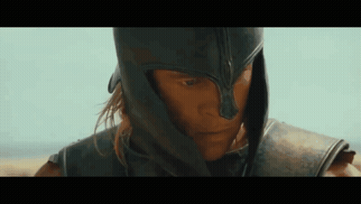 Man In Helmet And Armor Looking Down GIF