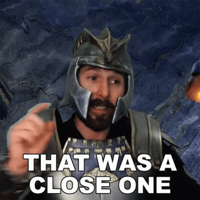 Man In Helmet And Armor Says That Was A Close One GIF