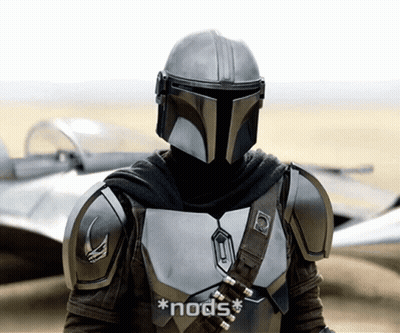 Man In Helmet And Armor Talking To Woman GIF