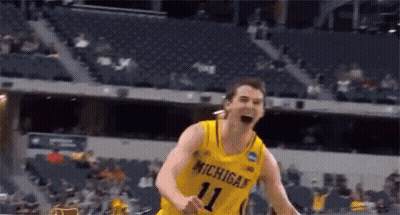 Man In Helmet And Gloves Waving GIF
