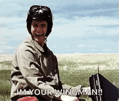 Man In Helmet And Goggles Holding Briefcase And Remote Control In Field GIF