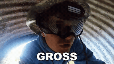 Man In Helmet And Goggles Saying Gross GIF
