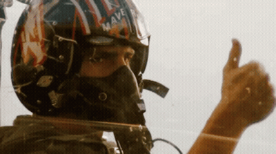 Man In Helmet And Mask Giving Thumbs Up GIF
