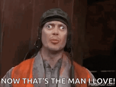 Man In Helmet And Orange Vest Making Funny Face GIF
