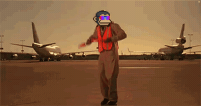 Man In Helmet And Orange Vest Walking GIF