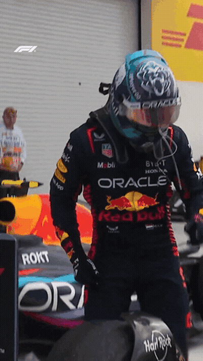 Man In Helmet And Red Bull Shirt GIF