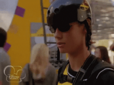 Man In Helmet And Sunglasses In Front Of Disney Logo GIF