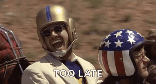 Man In Helmet And Sunglasses Sitting In Car GIF