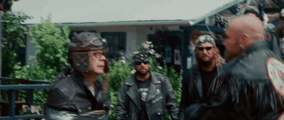 Man In Helmet And Sunglasses Talking To Another Man GIF