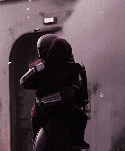 Man In Helmet Carrying Child GIF