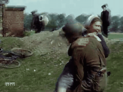 Man In Helmet Carrying Woman GIF
