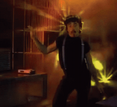 Man In Helmet Dancing At Microphone GIF