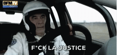 Man In Helmet Driving Car F*ck La Justice GIF