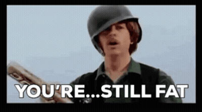 Man In Helmet Holding Bat Saying You're Still Fat GIF
