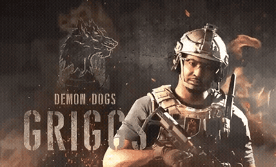 Man In Helmet Holding Gun Demon Dogs GIF