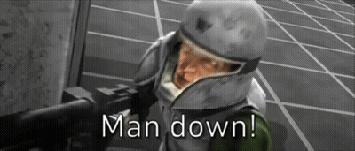 Man In Helmet Holding Gun Says Man Down GIF