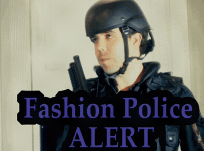Man In Helmet Holding Gun With Fashion Police Alert GIF