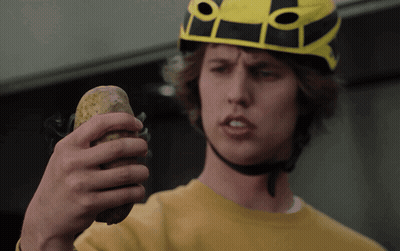 Man In Helmet Holding Potato GIF