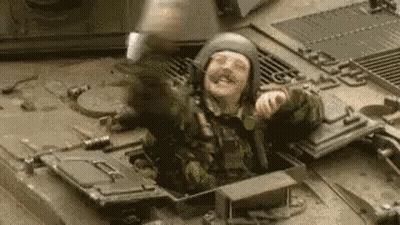 Man In Helmet In Military Vehicle GIF