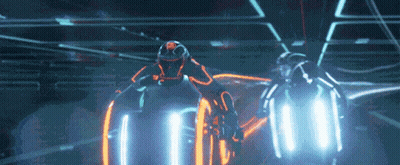 Man in Helmet Riding Futuristic Motorcycle in Dark Room