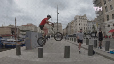 Man In Helmet Riding Mobility Scooter GIF